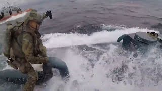 Suspected narcosub dramatically boarded by US Coast Guard [upl. by Ynoyrb]